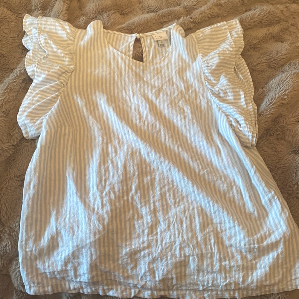 White and light blue striped shirt